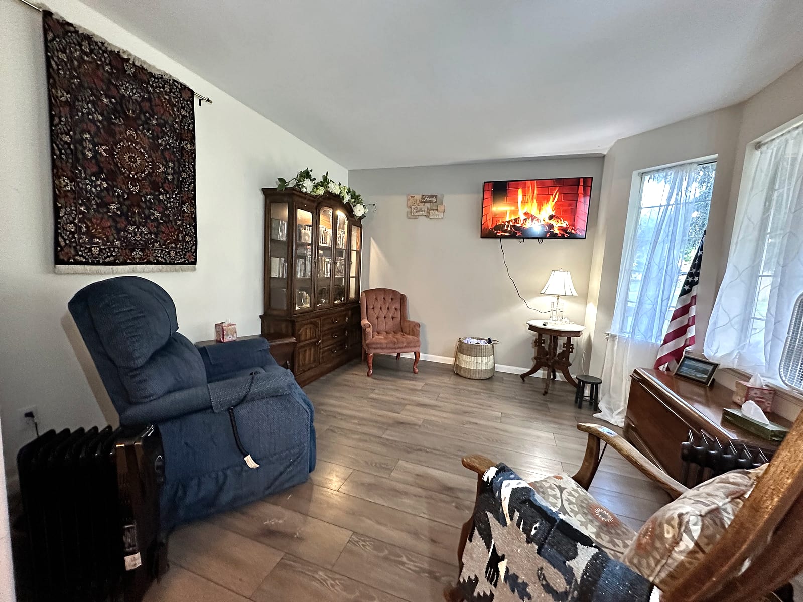 Cozy living room with fireplace and comfortable seating.